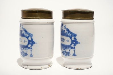 A pair of Dutch Delft blue and white albarello pharmacy jars with brass covers, 18th C.